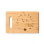 Wedding Monogram Script Personalized Names Cutting Board<br><div class="desc">Wedding Monogram Script Personalized Names Cutting Board features your personalized monogram in elegant modern script typography with your custom names,  wedding date and accented with a love heart. Perfect for wedding gifts for the newlyweds. Designed by Evco Studio www.zazzle.com/store/evcostudio</div>