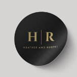 Wedding Monogram Simple Classic Chic Black Gold Round Sticker<br><div class="desc">Elevate the sophistication of your wedding details with our Wedding Monogram Simple Classic Chic Minimal Black and Gold Classic Round Stickers. Featuring a timeless black and gold color scheme, these stickers add a touch of opulence to your wedding stationery. The minimalist design, with the bride and groom's initials, creates a...</div>
