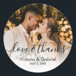 Wedding Photo Calligraphy Script Photo Thank You Classic Round Sticker<br><div class="desc">Modern Pretty Calligraphy Black White Script Thank You | Couple Photo Wedding sticker/label for yor gift favor. Featuring an elegant handwritten style calligraphy overlay with text „Love and Thanks”.</div>