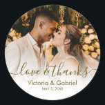Wedding Photo Gold Script Photo Thank You Classic Round Sticker<br><div class="desc">Modern Pretty Gold Calligraphy Script Thank You | Couple Photo Wedding sticker/label for yor gift favor. Featuring an elegant handwritten style calligraphy overlay with text „Love and Thanks”.</div>