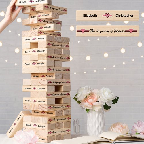 Wedding reception newlyweds names hearts pink topple tower