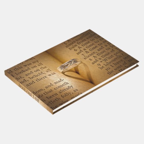 Wedding Ring Heart Shadow On Bible  Guest Book
