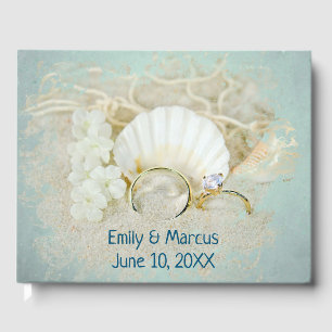 Wedding Rings and Seashell In Sand Guest Book