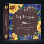 Wedding Sunflower Blue Floral Lights Photo Album 3 Ring Binder<br><div class="desc">This binder has been designed for wedding photos. It features a watercolor floral border design with sunflowers,  blue roses and flowers,  foliage,  string lights and a wood grain background. Personalize the names and date on the front and the text on the spine.</div>