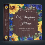 Wedding Sunflower Blue Floral Lights Photo Album 3 Ring Binder<br><div class="desc">This binder has been designed for wedding photos. It features a watercolor floral border design with sunflowers,  blue roses and flowers,  foliage,  string lights and a wood grain background. Personalize the names and date on the front and the text on the spine.</div>