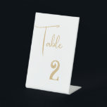 Wedding Table Number Card Pedestal Sign<br><div class="desc">This wedding table number card is shown in the plastic pedestal style with a modern layout. 
Color White  Text in a Gold color. 
Customize this item and change the number to what you need.</div>