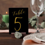 Wedding table number gold glitter black elegant<br><div class="desc">Faux gold foil formal calligraphy script wedding reception table card. The black background color is editable. You can change it after pushing CUSTOMIZE button.
You can find the whole range of numbers (1 - 50) here: http://bit.ly/2sLMaFh 
If you need help,  please contact me through the store bellow.</div>