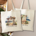 Weekend Beach Wedding Personalized Welcome Tote Bag<br><div class="desc">Beach themed personalized weekend wedding welcome tote bag for guests. This charming design features a watercolor scene of a wooden wedding ceremony pagoda, on an oceanfront beach, draped with voiles and tropical flowers. On the otherside there is rustic boho welcome sign which you can also personalize. Perfect for a casual...</div>