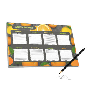 Weekly planner with oranges notepad