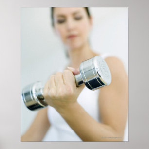 Weightlifting. Woman lifting dumbbells. This Poster