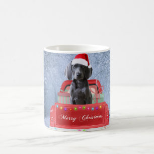 Weimaraner Dog in Snow sitting in Christmas Truck Coffee Mug