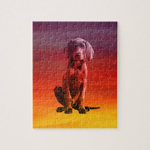 Weimaraner Dog Sitting On Beach Jigsaw Puzzle