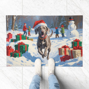 Weimaraner Running in Snow with Christmas Hat Doormat
