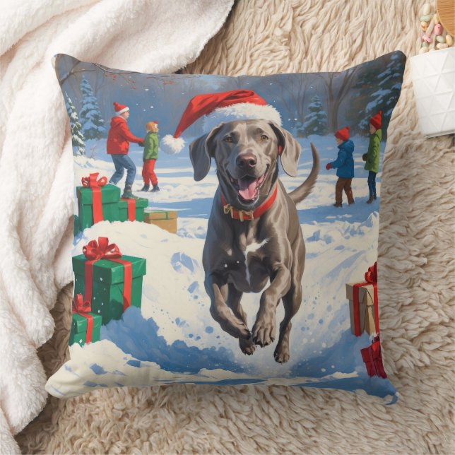 Weimaraner Running in Snow with Christmas Hat Throw Pillow (Blanket)