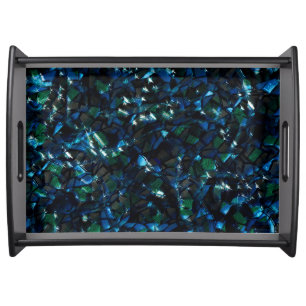 Weird mosaic over dark background and hazy sparkle serving tray