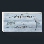 Welcome Beach House Dolphin Costal  Wooden Box Sign<br><div class="desc">This design may be personalized in the area provided by changing the photo and/or text. Or it can be customized by clicking Personalize this Template and then choosing the click to customize further option and delete or change the color of the background, add text, change the text color or style,...</div>
