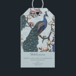 Welcome Elegant Dusty Blue Floral Peacock Gift Tags<br><div class="desc">These elegant Welcome Dusty Blue Floral Peacock Gift Tags features hand-drawn blue and teal peacocks perched on Magnolia tree branches in bloom in Chinoiserie style pattern. All against an elegant dusty blue background with floral silhouette detailing. The back features the same pattern. Personalize with your own heading (Welcome, Happy Birthday,...</div>