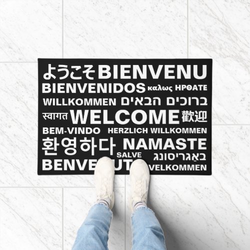 Welcome in different languages black white modern doormat