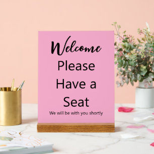 Welcome Please Have a Seat Pink and Black Text Acrylic Sign
