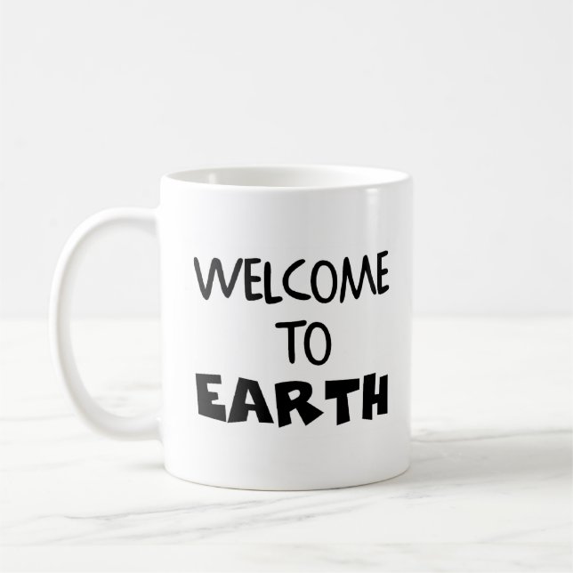 welcome to earth coffee mug (Left)