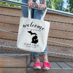 Welcome to Michigan | State Silhouette Wedding Tote Bag<br><div class="desc">Give your guests a warm welcome to your Michigan wedding with a bag full of snacks and treats personalized with the state where you're getting married and the bride and groom's names and wedding date. Design features "welcome" in modern handwritten calligraphy script along with bride and groom's names and wedding...</div>