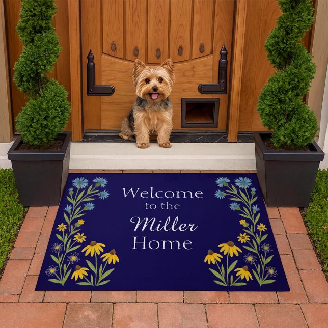 Welcome To our Home Blue Floral Doormat (Yorkie greets guests at the Miller home entrance, flanked by topiaries and a floral welcome mat.)