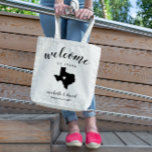 Welcome to Texas | State Silhouette Wedding Tote Bag<br><div class="desc">Give your guests a warm welcome to your wedding in Texas with a bag full of snacks and treats personalized with the state where you're getting married and the bride and groom's names and wedding date. Design features "welcome" in modern handwritten calligraphy script along with bride and groom's names and...</div>