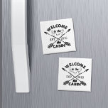 Welcome to the Cabin | Rustic Arrows & Pine Tree Magnet<br><div class="desc">Remind your guests (and yourself) that it's time to kick back and relax with this cute rustic-style fridge magnet. Design features "Welcome to the Cabin" in black sandblasted typography with a rope illustration,  pine trees and crossed arrows. Customize with your year established.</div>