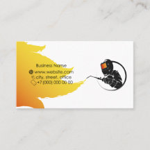 Welder in mask with welding machine in hand busine