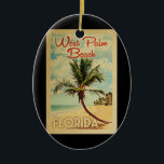 West Palm Beach Palm Tree Vintage Travel Ceramic Ornament<br><div class="desc">A uniquely retro mid-century modern West Palm Beach Florida art print in vintage travel poster style. It features a curved palm tree on sandy beach with ocean under a blue cloudy sky.</div>