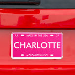 West Virginia License Plate<br><div class="desc">This vibrant pink license plate features the name "CHARLOTTE" prominently displayed in large, bold letters, complemented by the location "MORGANTOWN WV" at the bottom. The top of the plate includes "MADE IN THE USA" and the date "JUL 27, " adding a personalized and patriotic touch. Perfect for showcasing personal pride...</div>