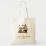 Western Boho Tote Bag<br><div class="desc">Give your girls something useful and adorable with this Last Rodeo tote bag, the perfect blend of function and flair. Featuring watercolor Western motifs—cowgirl hats, boots, and cacti—set against a soft yet bold color palette of desert neutrals, pinks, oranges, gold, and black, it’s perfect for packing essentials or gifting goodies....</div>