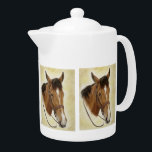 Western Horse Teapot<br><div class="desc">Add charm to your kitchen with a pretty western horse inspired teapot! Handsome and practical,  this equine porcelain teapot will bring your unique style to the table. Beautifully designed from an original oil painting titled “Safe Passage” by Artist Cathy Cleveland.</div>