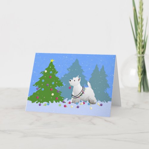 Westie Decorating a Christmas Tree in the Forest Holiday Card