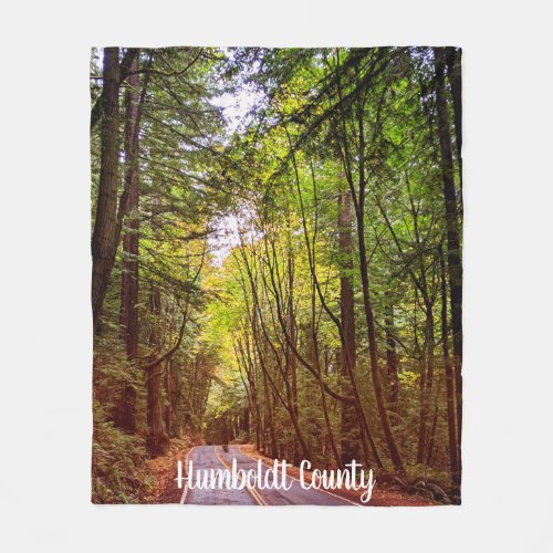 Wet Road Through Green Trees in Humboldt Autumn Fleece Blanket