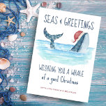 Whale Santa Nautical Seas & Greetings Christmas Holiday Card<br><div class="desc">Nautical humor Christmas card features a watercolor whale wearing a Santa hat swimming in the sea with string lights decorating its tail. The "Seas & Greetings" and "Wishing you a whale of a good Christmas" greetings,  along with the name can be personalized. Art by KL Stock</div>