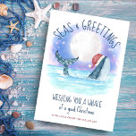 Whale Santa Sea Moon & Stars Christmas Holiday Card<br><div class="desc">Nautical humor Christmas card features a watercolor whale wearing a Santa hat swimming in the sea under a magical moon and stars with string lights decorating its tail. The "Seas & Greetings" and "Wishing you a whale of a good Christmas" greetings, along with the name can be personalized. Art by...</div>