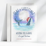 Whale Santa Sea Moon & Stars Christmas Holiday Card<br><div class="desc">Nautical humor Christmas card features a watercolor whale wearing a Santa hat swimming in the sea under a magical moon and stars with string lights decorating its tail. The "Seas & Greetings" and "Wishing you a whale of a good Christmas" greetings, along with the name can be personalized. Art by...</div>