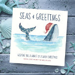 Whale Santa Sea Nautical Funny Christmas Holiday Card<br><div class="desc">Nautical humor Christmas card features a watercolor whale wearing a Santa hat swimming in the sea with string lights decorating its tail. The "Seas & Greetings" and "Wishing you a whale of a good Christmas" greetings,  along with the name can be personalized. Art by KL Stock</div>