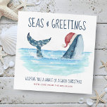 Whale Santa Sea Nautical Funny Christmas Holiday Card<br><div class="desc">Nautical humor Christmas card features a watercolor whale wearing a Santa hat swimming in the sea with string lights decorating its tail. The "Seas & Greetings" and "Wishing you a whale of a good Christmas" greetings,  along with the name can be personalized. Art by KL Stock</div>