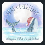 Whale Santa Seas & Greetings Nautical Christmas Square Sticker<br><div class="desc">Nautical humor Christmas stickers (or envelope seals) feature a watercolor whale wearing a Santa hat swimming in the sea under a magical moon and stars with string lights decorating its tail. The "Seas & Greetings" and "Wishing you a whale of a good Christmas" greetings can be personalized. Art by KL...</div>