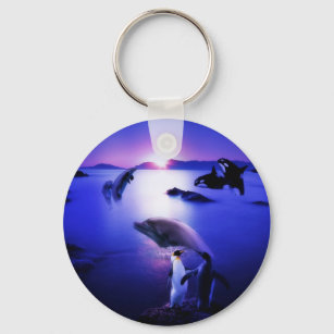 Whales dolphins penguins ocean sunset keychain