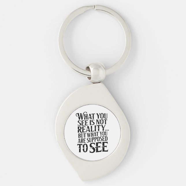 What you see is not reality...  keychain (Front)