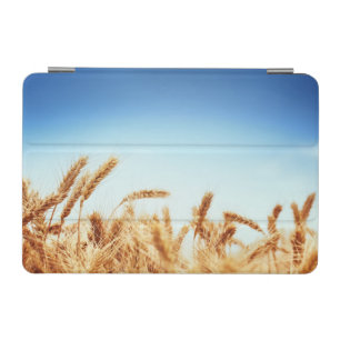 Wheat field against blue sky iPad mini cover