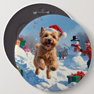 Wheaten Terrier Running in Snow with Christmas Hat Button