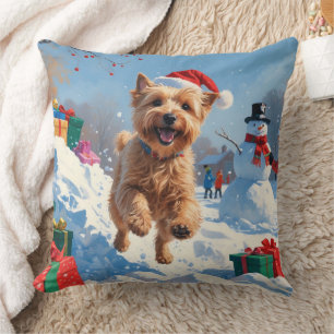 Wheaten Terrier Running in Snow with Christmas Hat Throw Pillow