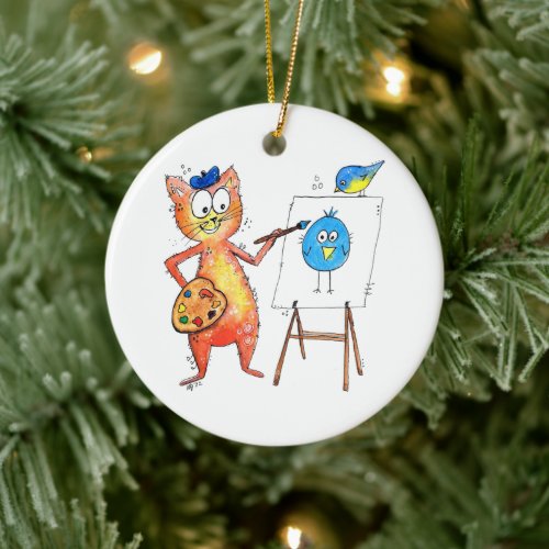Whimsical Artist Cat Painting a Bird Ceramic Ornament