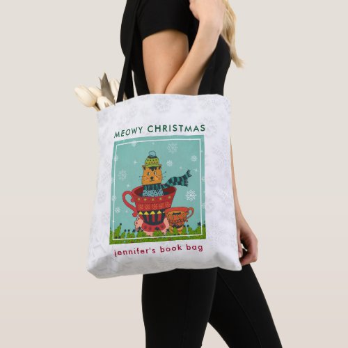 Whimsical Cat Sitting in a Teacup Christmas Tote Bag