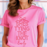 Whimsical coquette bow tying knot bridal shower T-Shirt<br><div class="desc">Whimsical coquette bow tying the knot modern boho elegant stylish handwritten bridal shower party favor decor matching t-shirt design. Contemporary red and pink collection.</div>