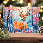 Whimsical Deer in Forest Cute Christmas Holiday Card<br><div class="desc">Send holiday cheer with this enchanting Christmas card featuring a whimsical deer in a colorful forest. The vibrant scene showcases the deer surrounded by snowy trees and bright foliage, complemented by a cheerful "Happy Holidays" greeting in blue. This delightful design is perfect for nature lovers and anyone who enjoys a...</div>